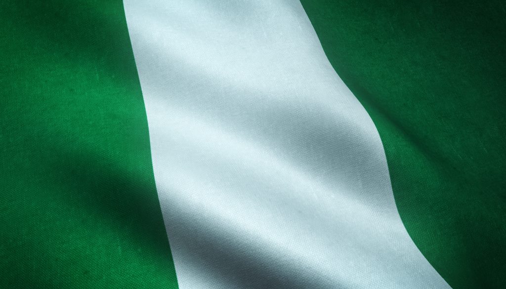 A closeup shot of the waving flag of Nigeria with interesting textures