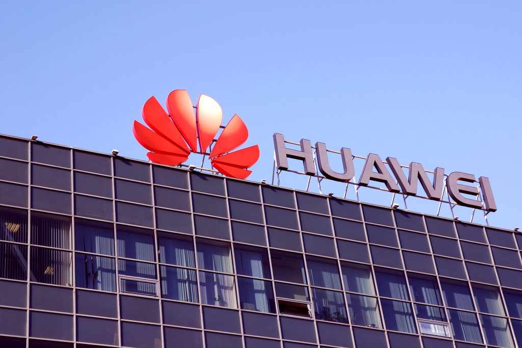 Moscow, Russia 30 August 2019 Huawei telecom company logo on office building  against clear blue sky